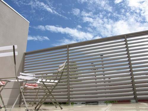 Enclose your patio with Louvre Blade Balcony Screen by Bayside Privacy Screens Bayside Privacy Screens Louvre Blade Balcony Screen