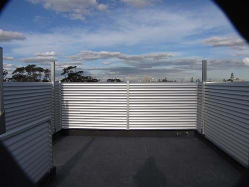 Louvre Blade Balcony Screens by Bayside Privacy Screens allow for the light to flow through