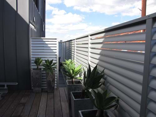 Louvre Blade Balcony Screening available in natural anodized or your choice of colour